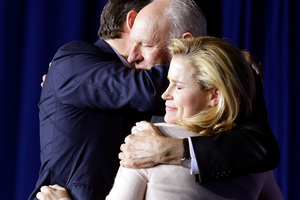 Republican presidential candidate, Senator Ted Cruz, hugs his wife, Heidi, and his father, Rafael. Photo / AP