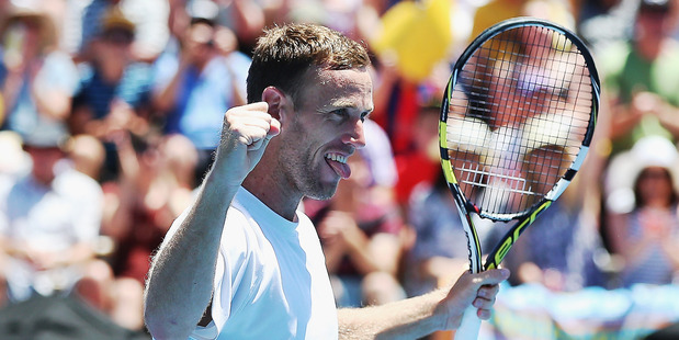 Michael Venus celebrates after winning the men's doubles final at the ASB Classic. Photo / Getty Images