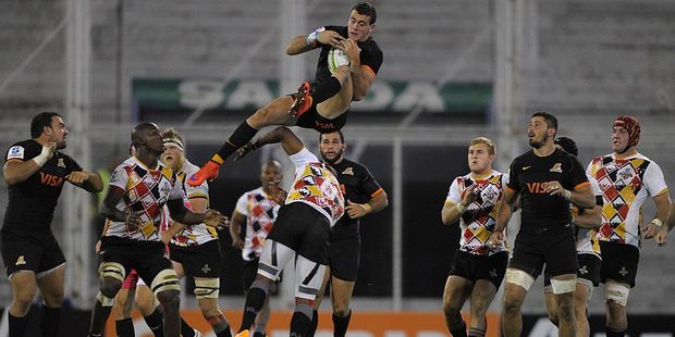 Jaguares' full back Emiliano Boffelli leaps over Kings fly-half Elgar Watts. Photo / Getty