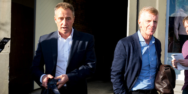 MediaWorks CEO Mark Weldon (L) leaves the Ponsonby Road office with members of the board. Photo / Dean Purcell