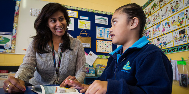 Reading recovery teacher Mary Jacob working with Gabriella Brown-Letele, 6, at Hay Park School. Photo / Jason Oxenham