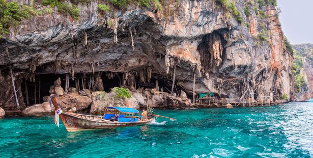 The Viking Cave (with bamboo scaffolding for bird's nest collectors to the left of the photo). Photo / 123RF