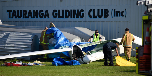 Emergency services at the scene of a glider crash at Tauranga Airport. Photo/George Novak