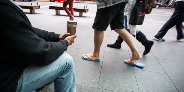 Begging is not an offence, but a bylaw makes it an offence to beg in a manner that may intimidate or cause a nuisance. Photo / File