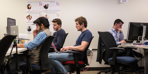 Viv Labs employees work at their desks in San Jose. Photo / Andrew Burton, The Washington Post