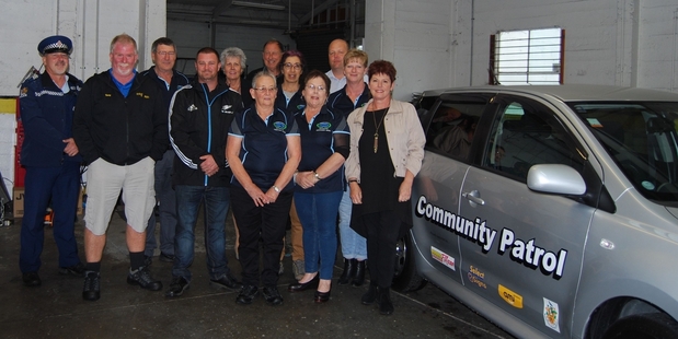 NEW CAR: Masterton Community Patrol members, police and sponsors gather to celebrate the handover of the keys to the new Community Patrol car.PHOTOS/ALISA YONG