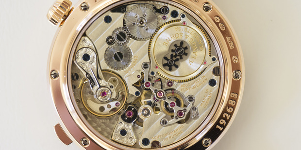A Richard Lange Tourbillion "Pour le Merite" luxury wristwatch in pink gold sits on display at the A. Lange & Soehne factory. Photo / Bloomberg