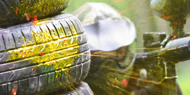 Physical contact - apart from shooting with pellets - is forbidden during paintball, and participants wear masks to protect their face. Photo / iStock