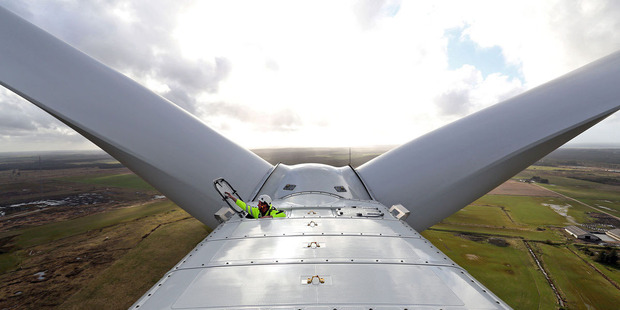 An employee closes the hatch after exiting the nacelle of a Vestas V164 wind turbine during operational testing at the Danish National Testing Centre in Osterild, Denmark. Photo / Bloomberg