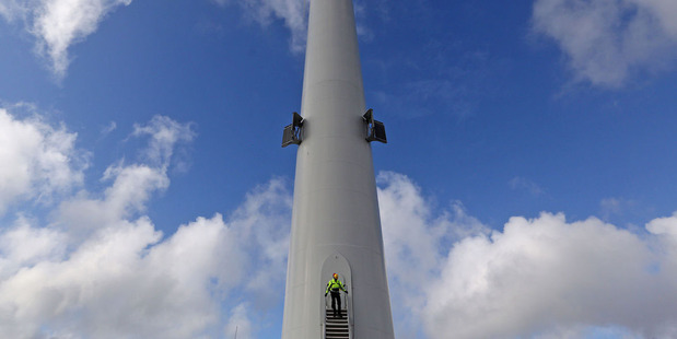 An employee exits a Vestas V164 wind turbine in Osterild . Photo / Bloomberg