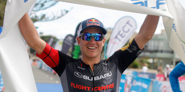 WINNING SMILE: Braden Currie wins his first Port of Tauranga Half at Mount Maunganui on Saturday. Photo: ANDREW WARNER