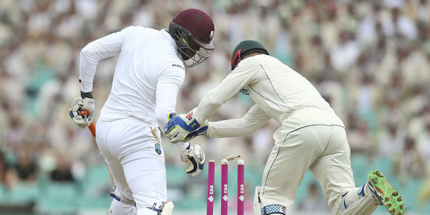 Carlos Braithwaite avoids being stumped by Peter Nevill. Photo / AP