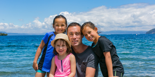 Quinn O'Connell with his three daughters Summer, Skye and India. Photo / Quinn O'Connell