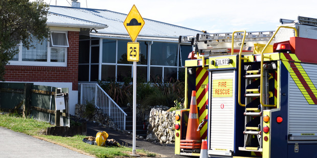 Greerton Fire Fighters at the scene of a garage fire at a Hynds Road property tonight. Photo/George Novak.