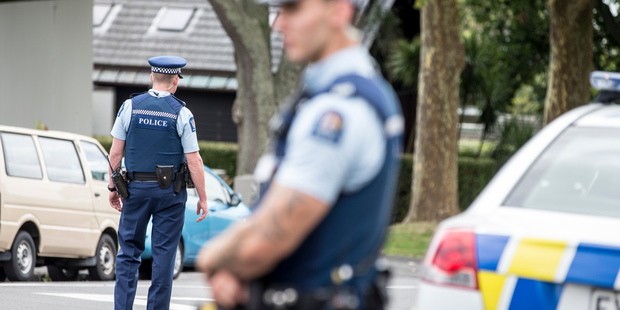 Police teams search for clues after an earlier incident on Shore Road Remuera after the body of a female jogger was found. Photo / Michael Craig