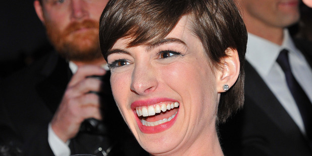 Anne Hathaway has posted a photo of her baby bump in a bikini on Instagram.