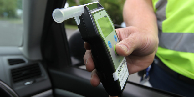 The new law cut the alcohol limit for drivers 20 and over from 400mcg of alcohol a litre of breath to 250mcg. Photo / Duncan Brown