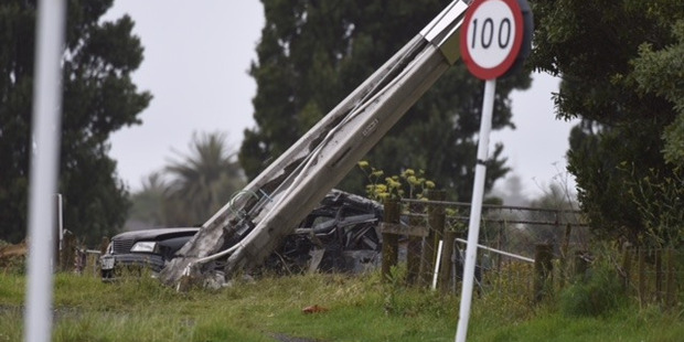 Power lines brought down near Kairua Rd rail crossing. Photo/George Novak.