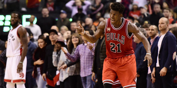 Jimmy Butler celebrates as he torches the Toronto Raptors. Photo / AP