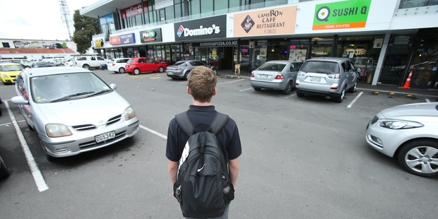 TANTALISING: Urban schools such as Tauranga Boys' College are flanked by fast-food outlets and dairies. Researchers want to restrict such shops through law changes.PHOTO/JOHN BORREN
