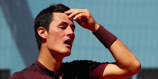 Bernard Tomic of Australia shows his dejection against Fabio Fognini. Photo / Getty Images