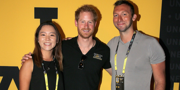 Lydia Ko poses with Prince Harry and Ian Thorpe at the Invictus Games. Photo / Getty