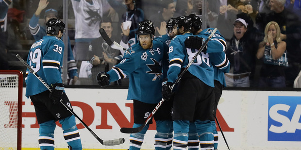 Joe Pavelski is congratulated by teammates after he scored a goal against Nashville. Photo / Getty Images