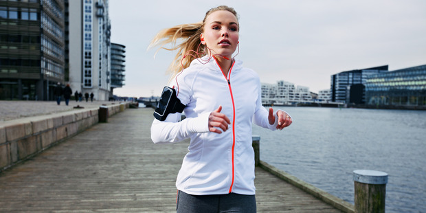 Kiwi scientists have unveiled wearable technology that can be powered by your own body motion - and it may eventually be possible to self-charge your smartphone. Photo / Getty Images