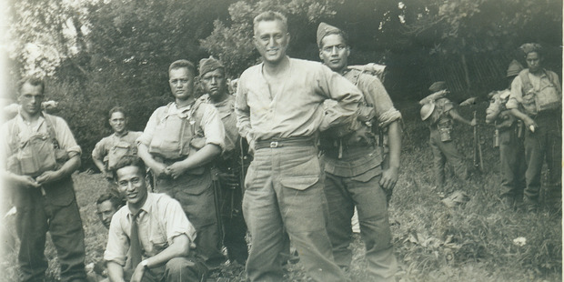 Hekia Parata's grandfather Arnold Reedy (centre of image with hands on hips) in England during WWII. Photo / Supplied