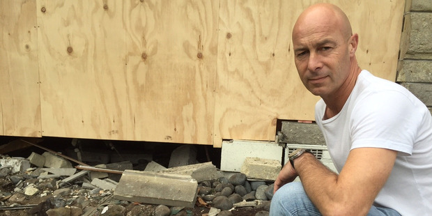 Mark Houghton stands in front of the house of his parents Gary and Maureen in the Waikato. Maureen died from a heart attack after a car smashed into their house. Photo / Supplied