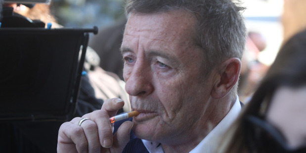 Phil Rudd arriving at Court in Tauranga in July 2015. Photo / Alan Gibson