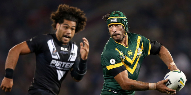 Kiwis prop Adam Blair chases Johnathan Thurston. Photo / Getty Images