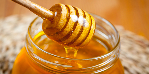 The West Coast beekeeper, who used to sell honey outside the Greymouth library, is in a remand prison in Australia. Photo / iStock