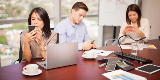 Onslaught of emails and pointless meetings can waste valuable time at work. Photo / iStock
