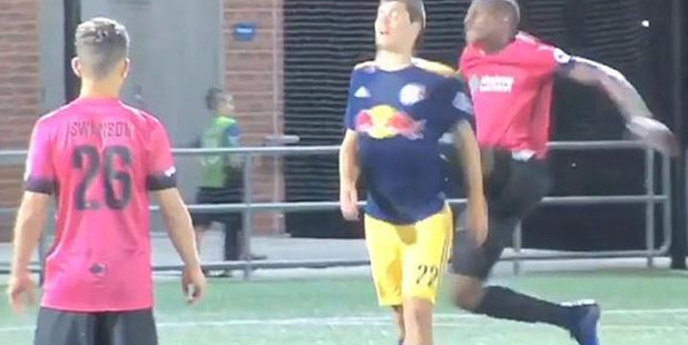 Romeo Parkes kicks New York Red Bulls II defender Karl Ouimette in the back after both were sent off. Photo / Twitter