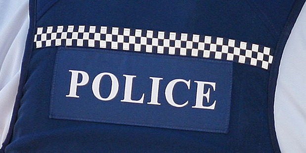 A man is in police custody and has been charged with injuring with intent, wounding with intent and burglary. Photo / File