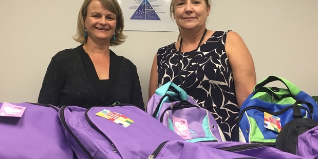 Waikato co-ordinator Mirjam Sole (left) and Waikato West social work resource assistant Lorraine Morgan with a new delivery of backpacks. Photo / supplied