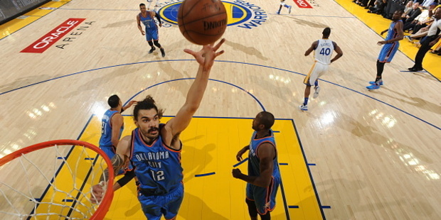Steven Adams grabs the rebound against the Golden State Warriors. Photo / Getty Images