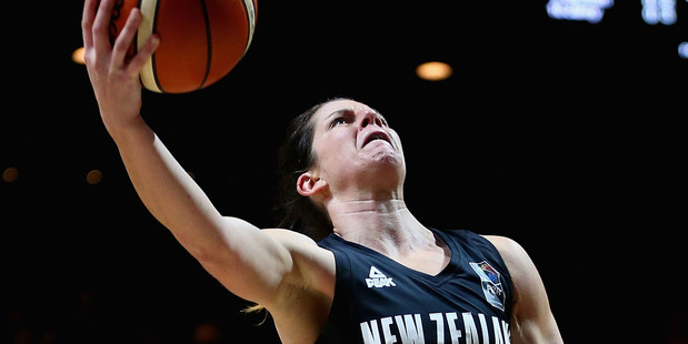 Micaela Cocks drives to the basketball against Australia. Photo / Getty Images