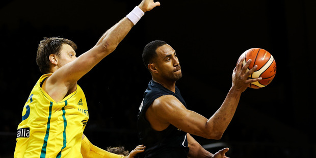 Mika Vukona of the Tall Blacks passes against Australia. Photo / Getty Images