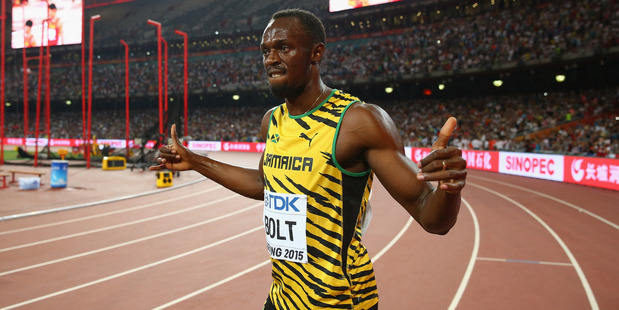 Usain Bolt celebrates at the 15th IAAF World Athletics Championships. Photo / Getty Images