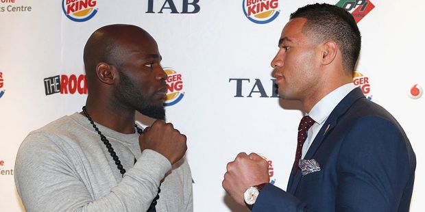 Carlos Takam and Joseph Parker pose during their press conference. Photo / Getty