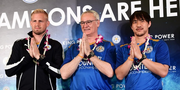 Kasper Schmeichel, Claudio Ranieri and Shinji Okazaki during their week-long visit to Thailand. Photo / Getty Images