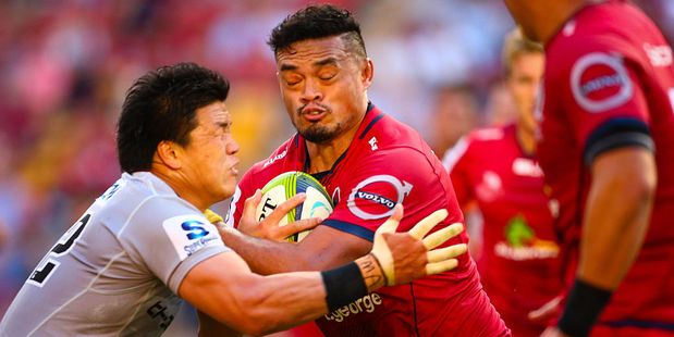 Queensland Reds player Hendrik Tui is tackled by Harumichi Tatekawa. Photo / Getty