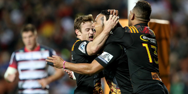 The Chiefs celebrate Toni Pulu's try during their win over the Rebels. Photo / Getty