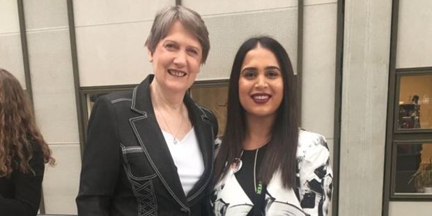 Aspiring human rights lawyer Rez Gardi, came to New Zealand from Pakistan as a refugee, meets Helen Clark in Copenhagen. Photo / Supplied
