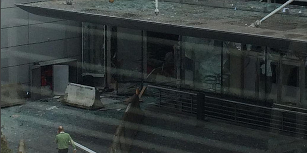 Blown-out windows at Brussels airport after two explosions were triggered at the departures terminal on March 22. Photo / Instagram
