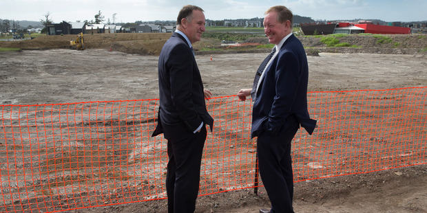April 26, 2016: Prime Minister John Key with Minister of Housing Nick Smith at the launching of the new affordable housing development at Hobsonville Point. Photo / Brett Phibbs