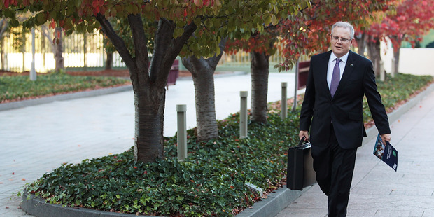 Australian Treasurer Scott Morrison arrives at Parliament in Canberra to read the Budget. Picture / Getty