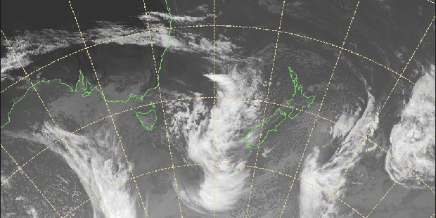 THREAT: The active front approaches New Zealand from the Tasman Sea in this MetService satellite photo from yesterday.